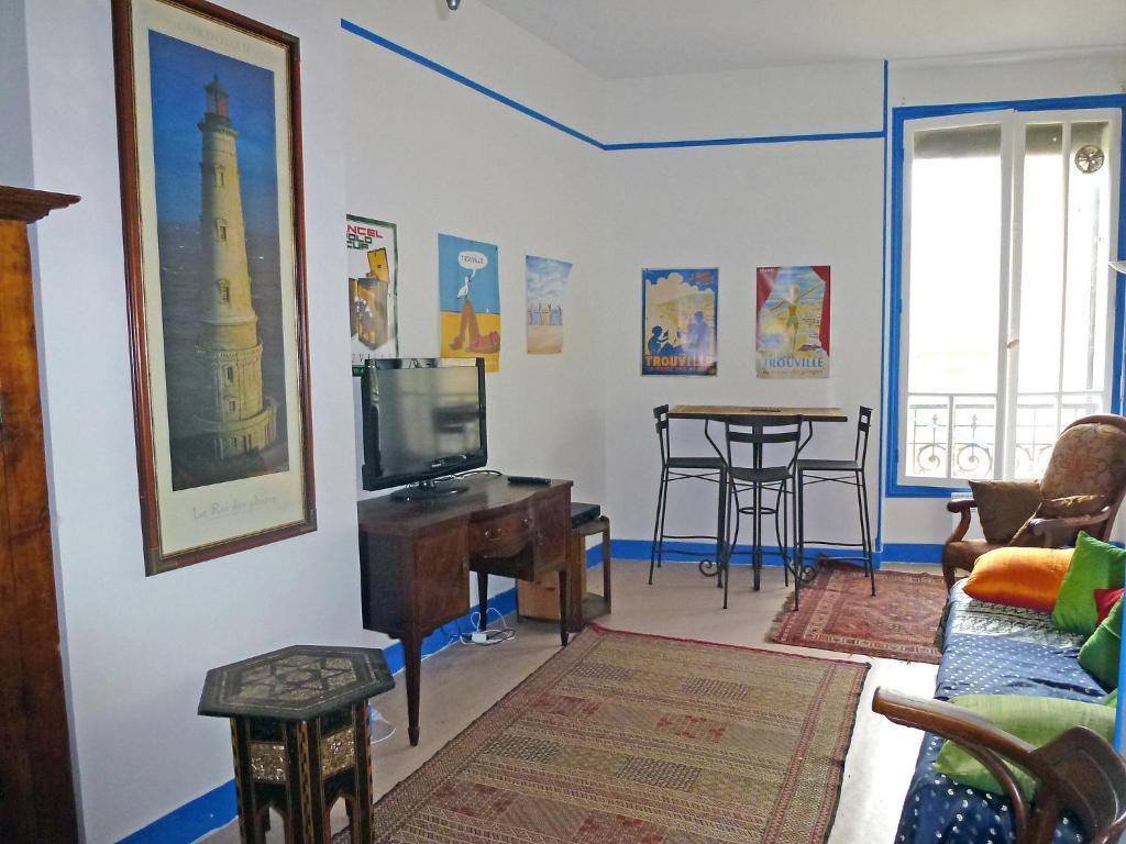 Paradis les pieds sur le sable trouville palace Chambre photo